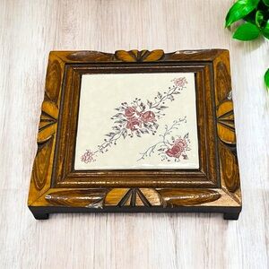 Carved wood trivet with Mexican‎ floral tile inlay